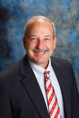 Portrait of Michael Mark, Commercial Real Estate Broker, CCIM.